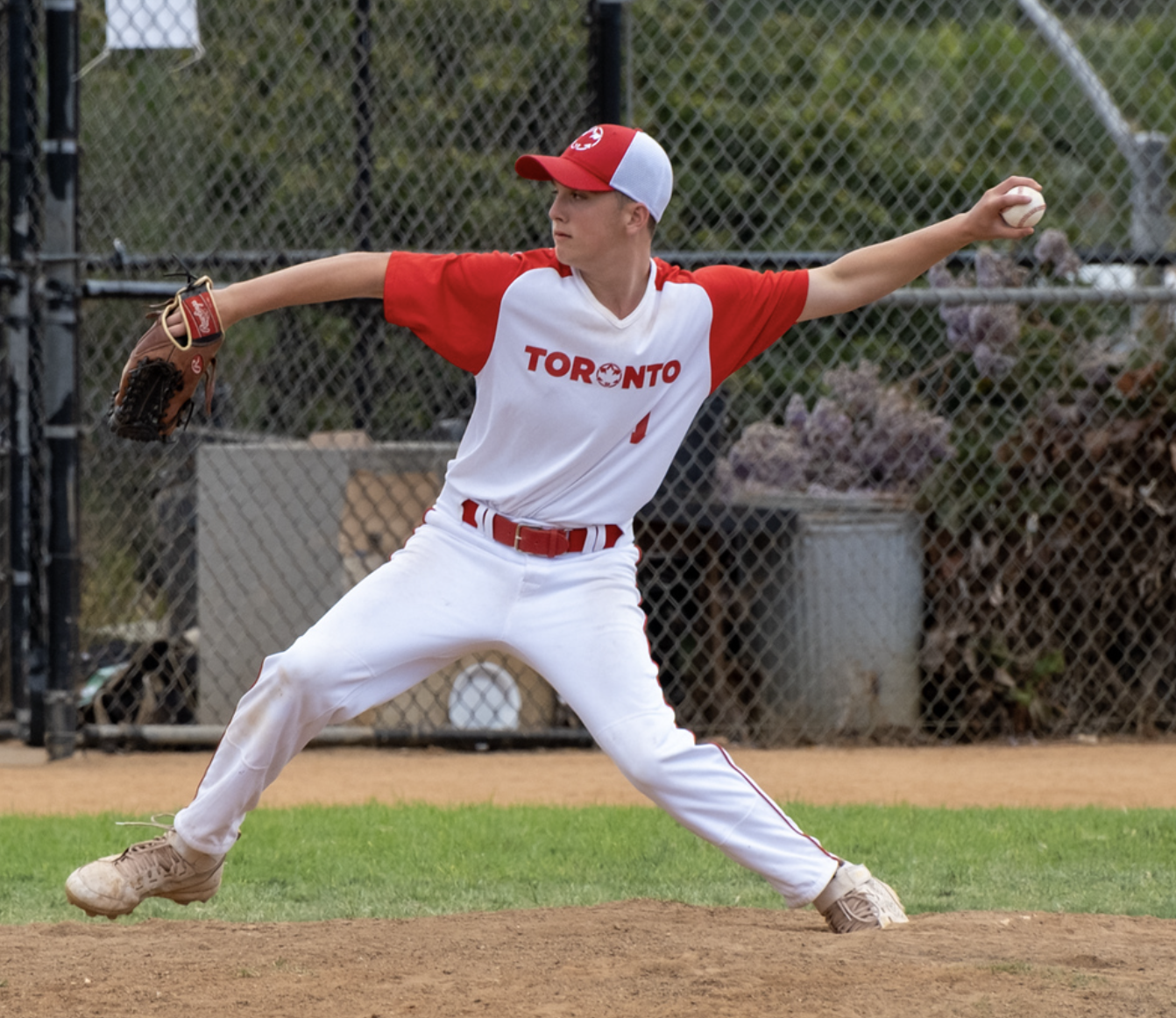 Baseball player wearing the Toronto JCC Maccabi uniform and cap